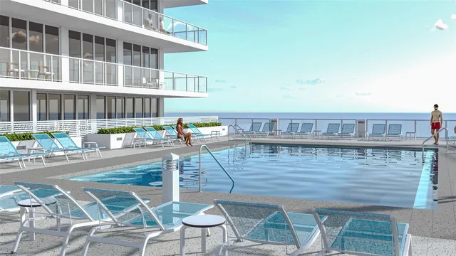 a view of multiple houses with a swimming pool