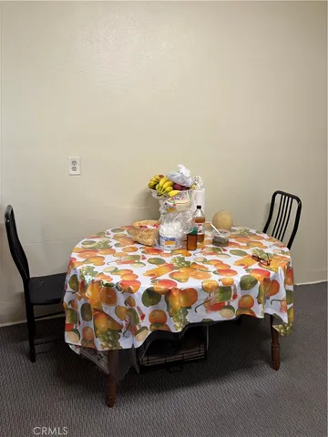 a bedroom with a bed and a chair