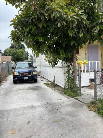 a car parked in front of a house
