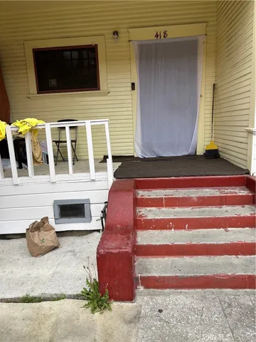 a front view of a house with a garage