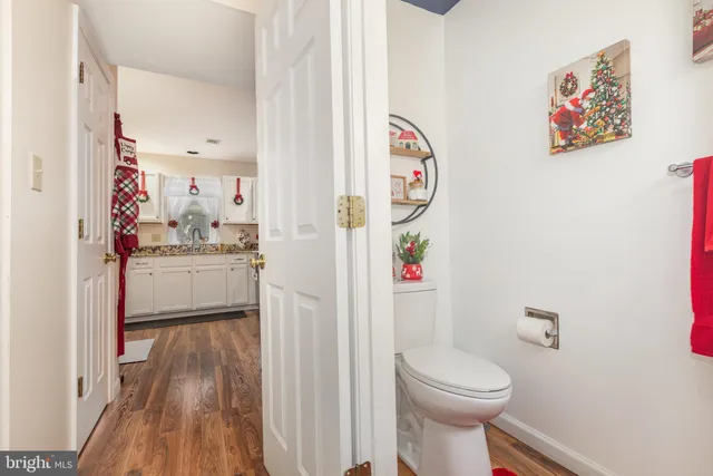 a bathroom with a toilet and a sink