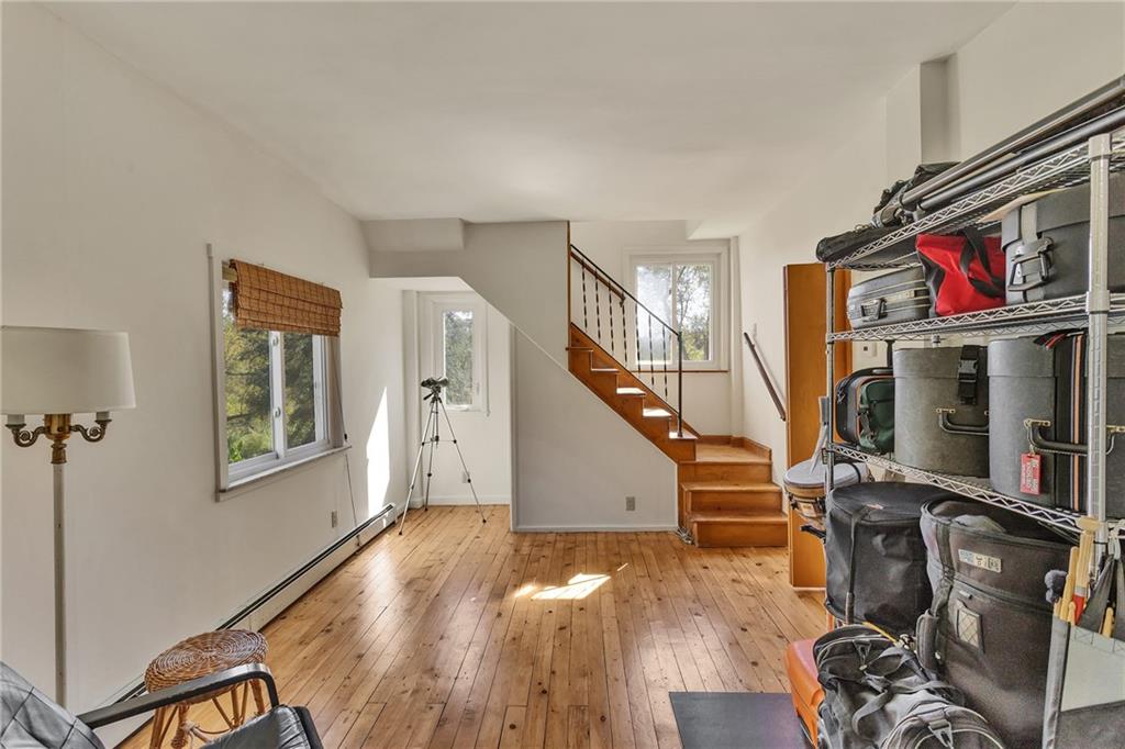 4032 Ewalt Road Gibsonia, PA 15044 - Photo 13 of 39 a view of entryway with wooden floor and stairs