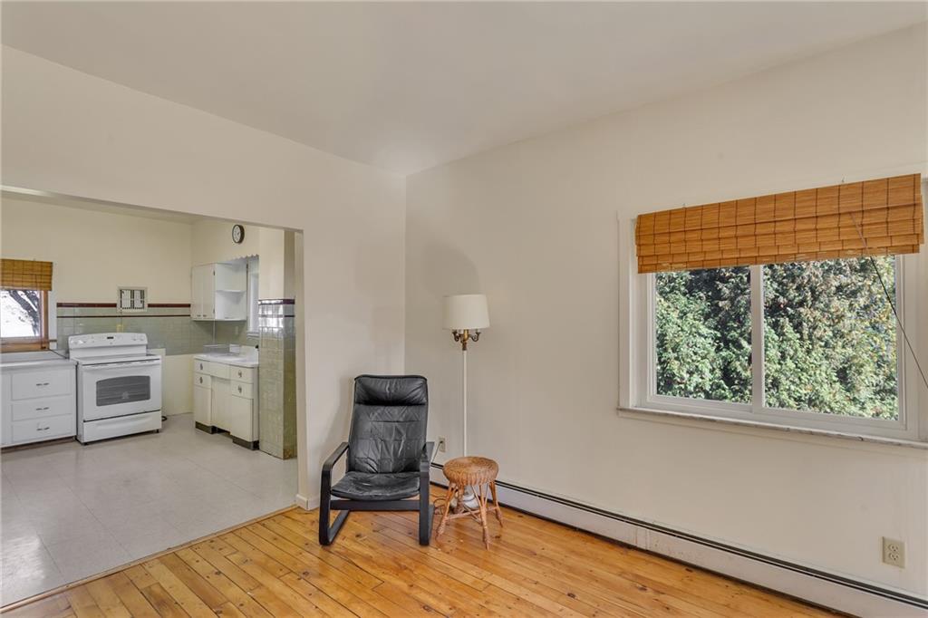 4032 Ewalt Road Gibsonia, PA 15044 - Photo 14 of 39 a view of workspace with wooden floor lounge chair and windows