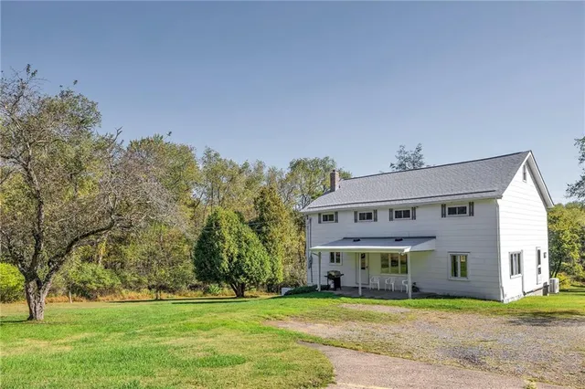 a front view of house with yard