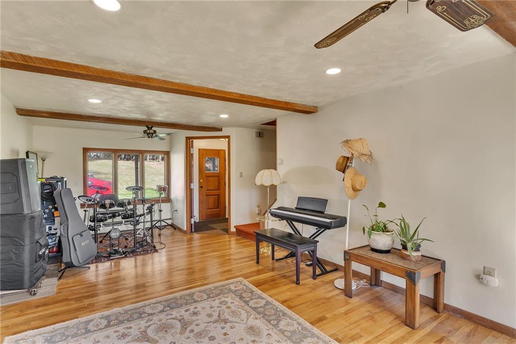 4032 Ewalt Road Gibsonia, PA 15044 - Photo 22 of 39 a living room with furniture and wooden floor