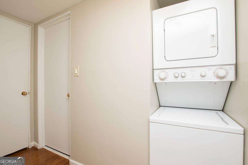 3660 Peachtree Road Northeast, Unit E7 Atlanta, GA 30319 - Photo 15 of 17 a utility room with dryer and washer