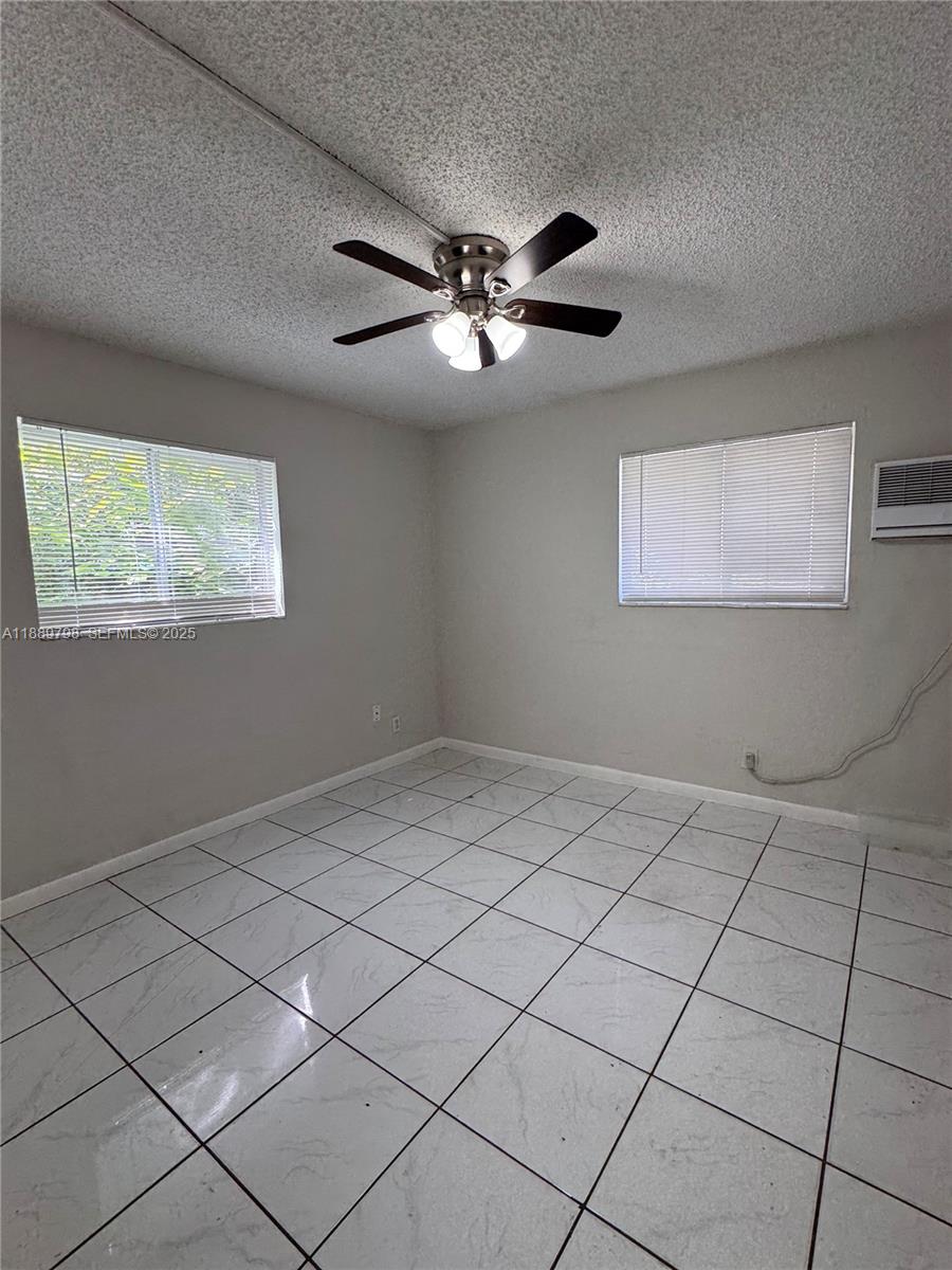 2150 Madison Street, Unit 20 Hollywood, FL 33020 - Photo 4 of 9 a view of an empty room and window