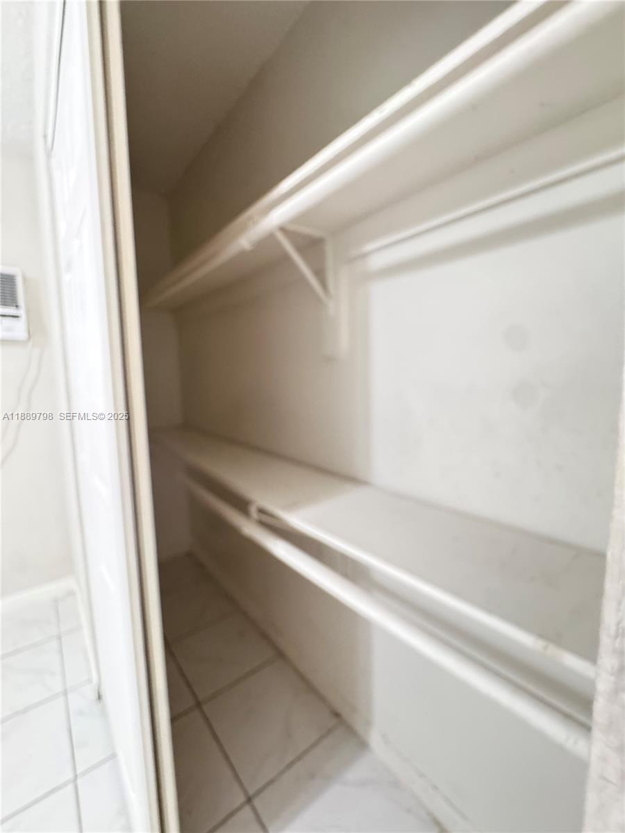 2150 Madison Street, Unit 20 Hollywood, FL 33020 - Photo 5 of 9 a bathroom with a bathtub