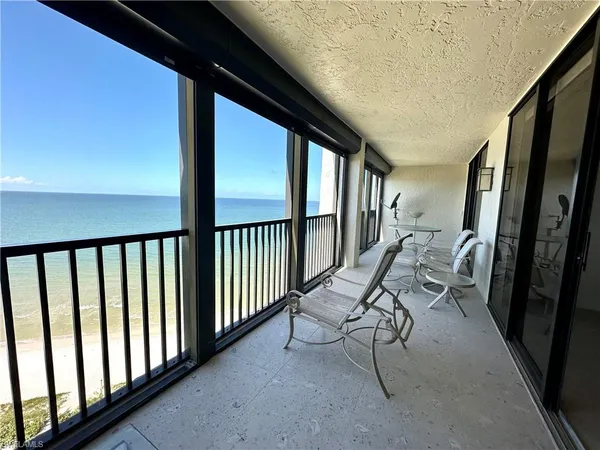 a view of chairs in the balcony
