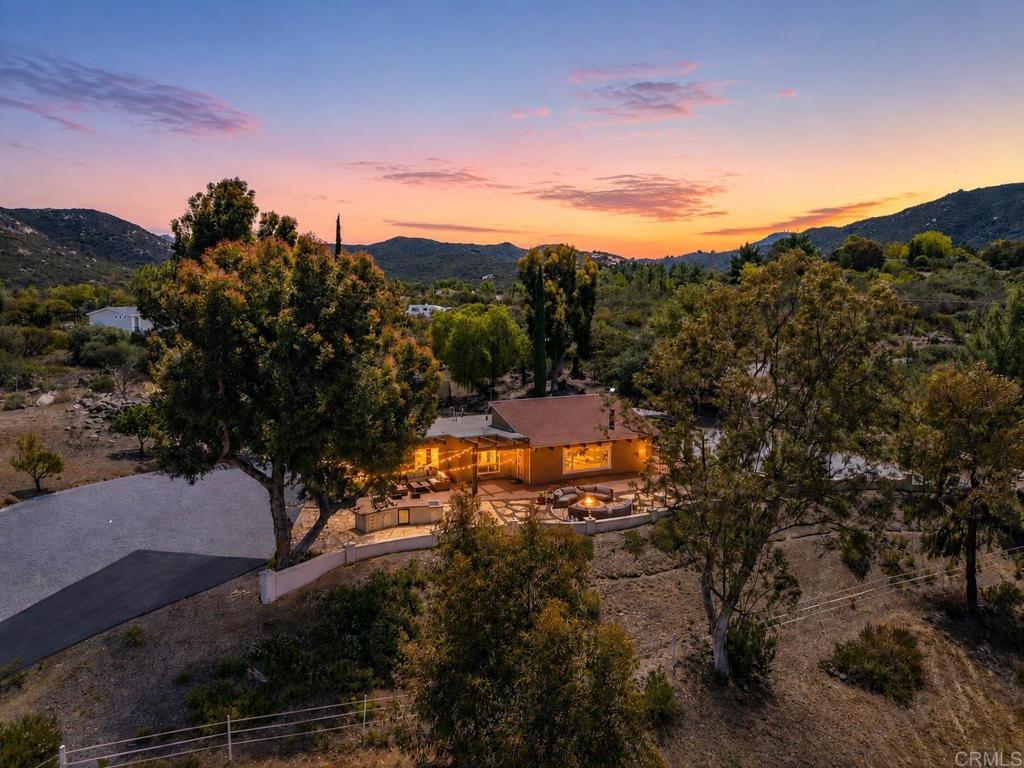 17089 Lawson Valley Road Jamul, CA 91935 - Photo 1 of 33 a view of a swimming pool with a yard