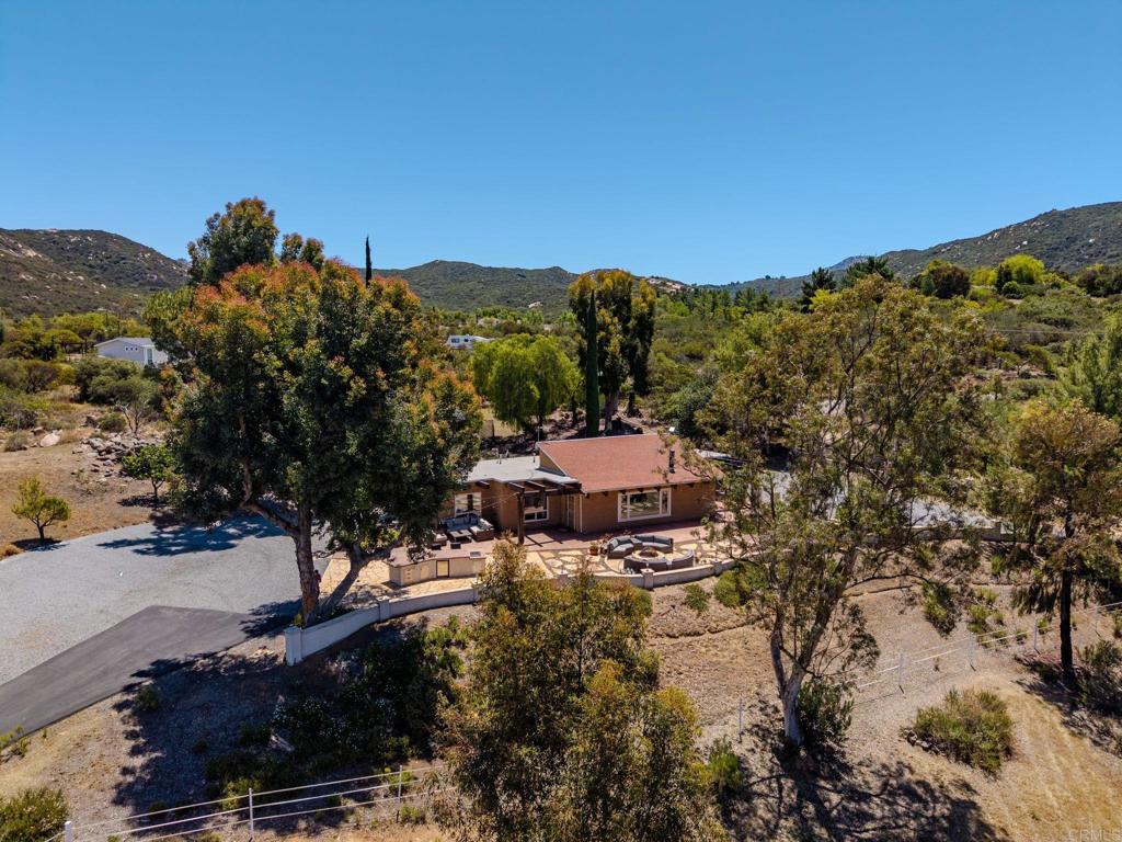 17089 Lawson Valley Road Jamul, CA 91935 - Photo 2 of 33 a view of a houses with a yard