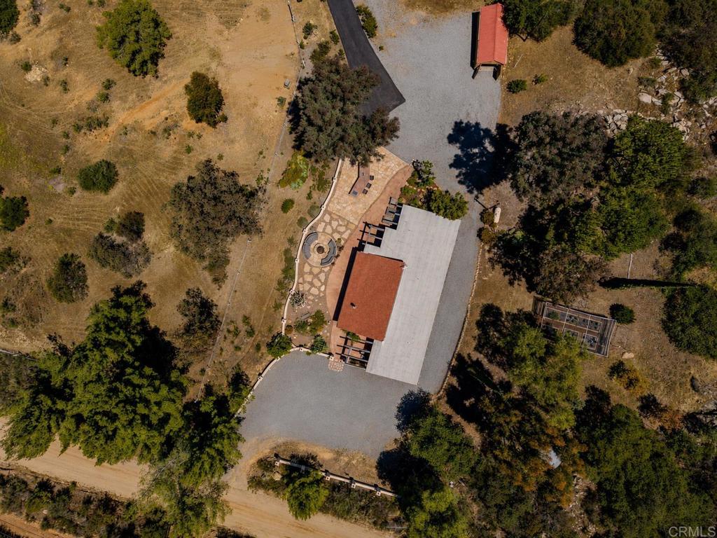 17089 Lawson Valley Road Jamul, CA 91935 - Photo 26 of 33 an aerial view of a house with a yard and covered with swimming pool