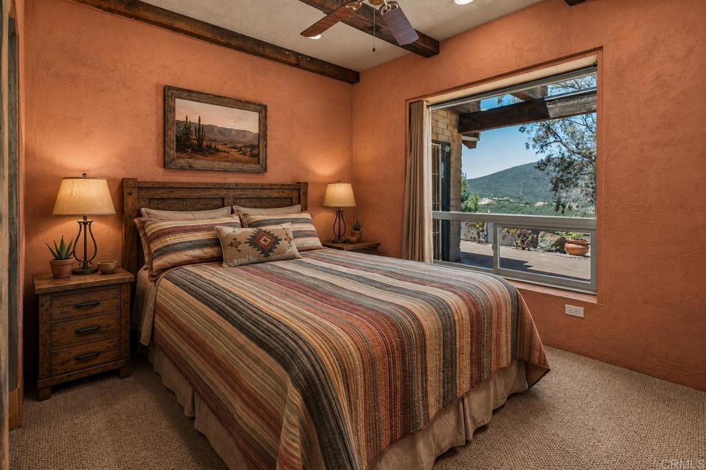 17089 Lawson Valley Road Jamul, CA 91935 - Photo 9 of 33 a bedroom with a bed and a window
