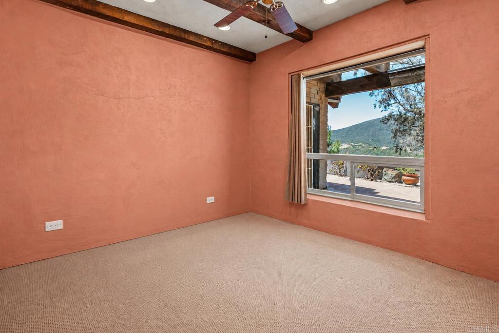 17089 Lawson Valley Road Jamul, CA 91935 - Photo 10 of 33 an empty room with a window