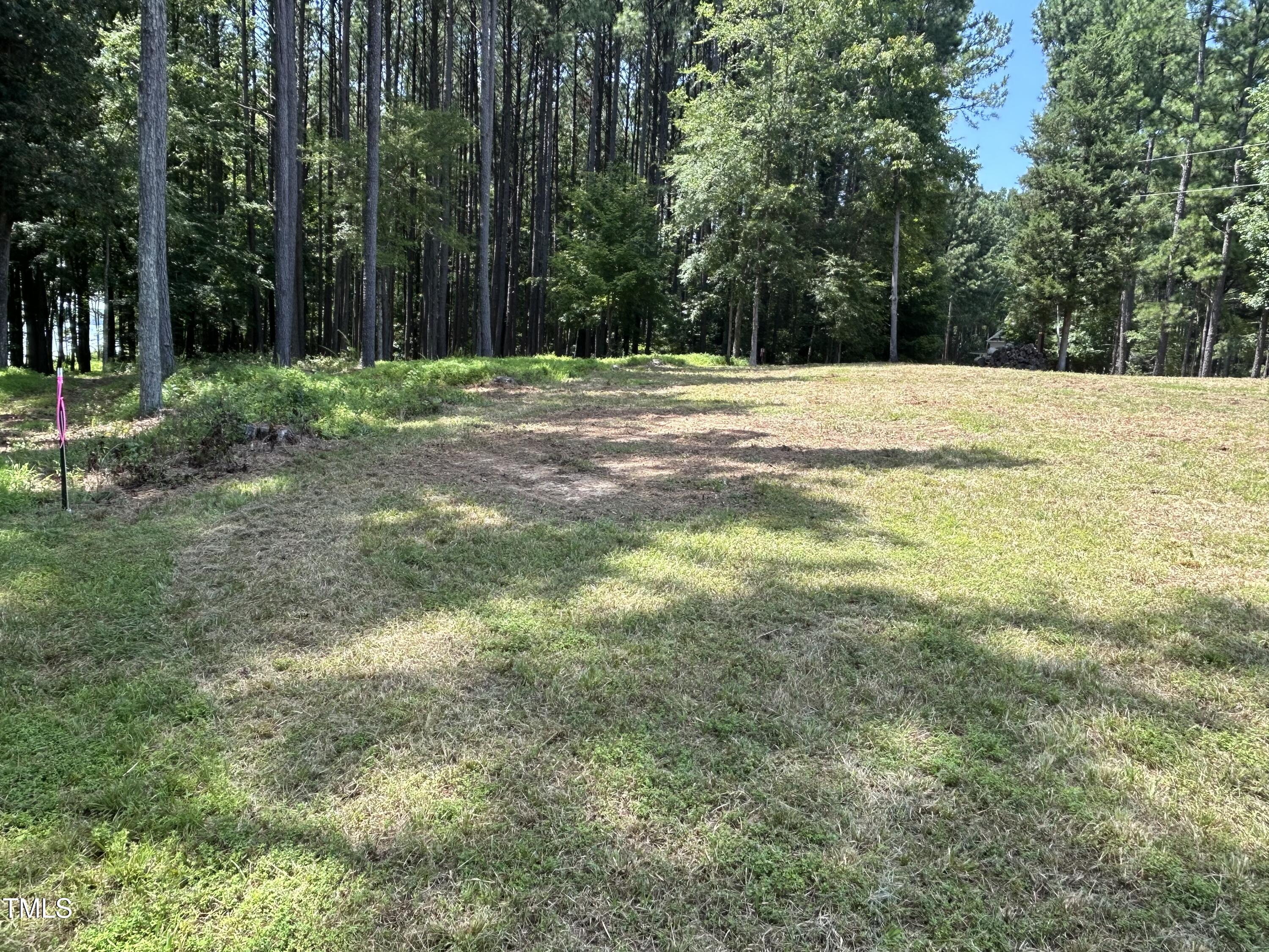 317 Doc Lane Manson, NC 27553 - Photo 14 of 22 a swimming pool with trees in the background