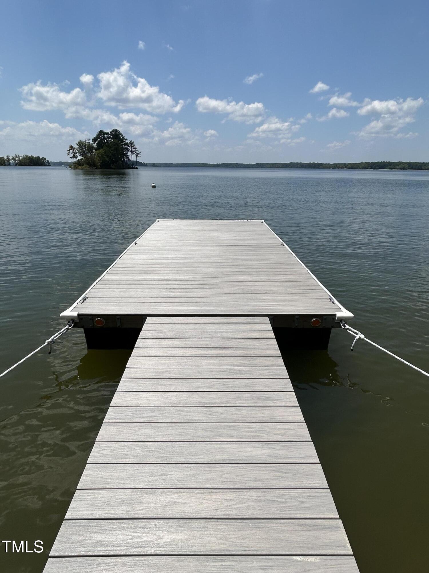 317 Doc Lane Manson, NC 27553 - Photo 4 of 22 a view of a lake from a balcony