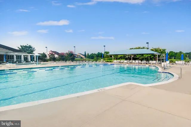 a view of a room with cabinet and windows