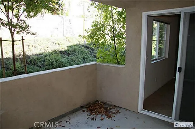 a view of a balcony with an outdoor space