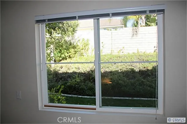 a view of a room with a large window