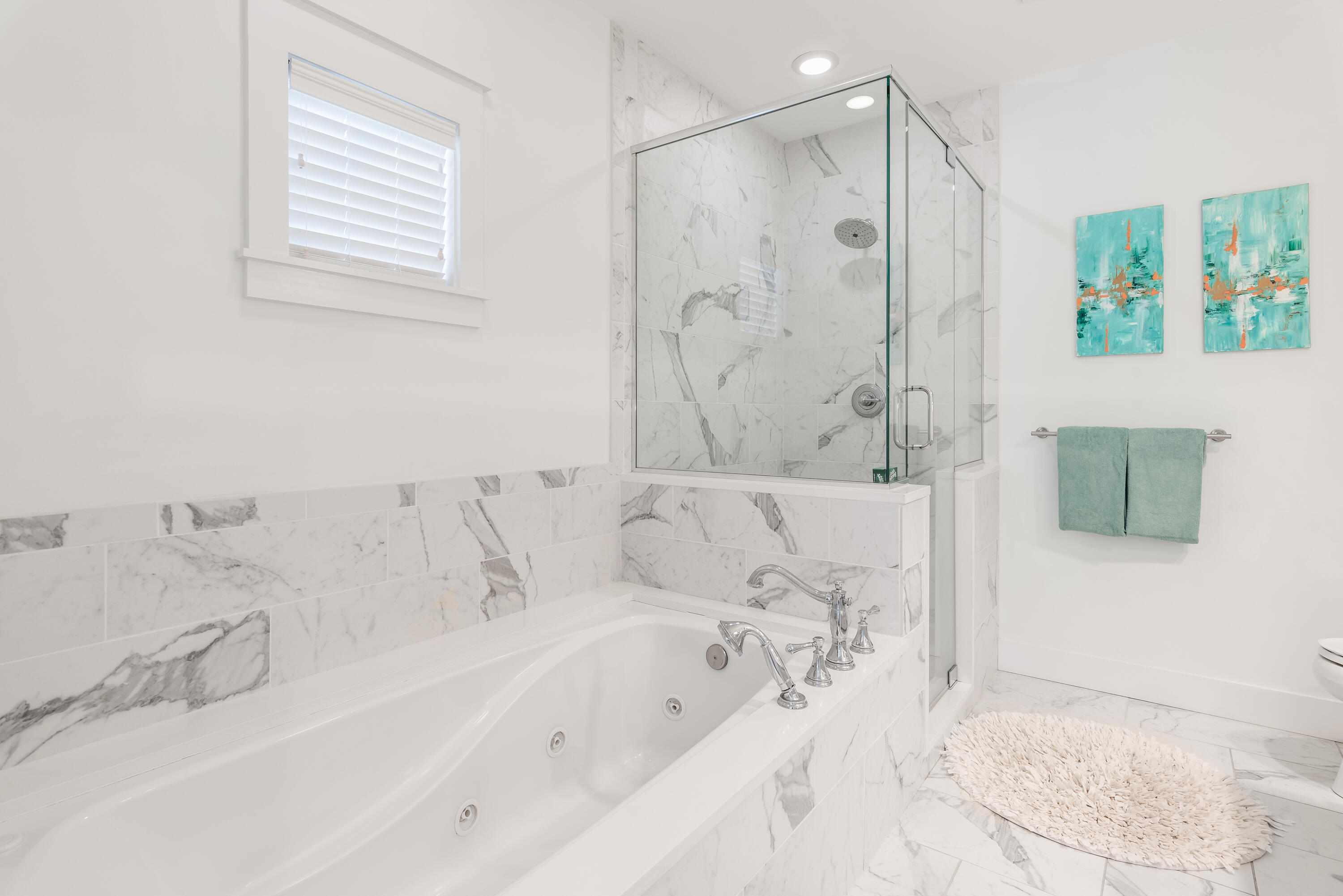 301 South Gulf Drive Santa Rosa Beach, FL 32459 - Photo 13 of 26 a bathroom with a bathtub and a shower