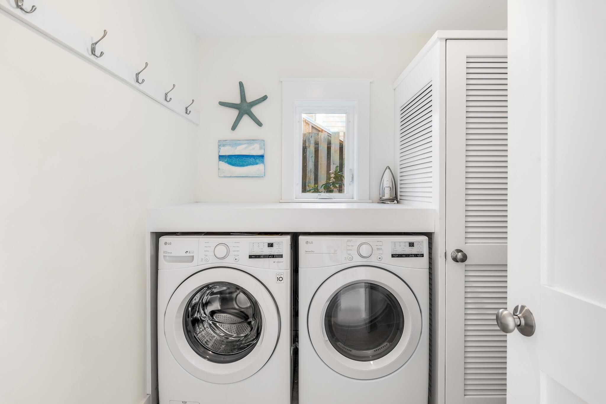 301 South Gulf Drive Santa Rosa Beach, FL 32459 - Photo 19 of 26 a utility room with dryer and washer