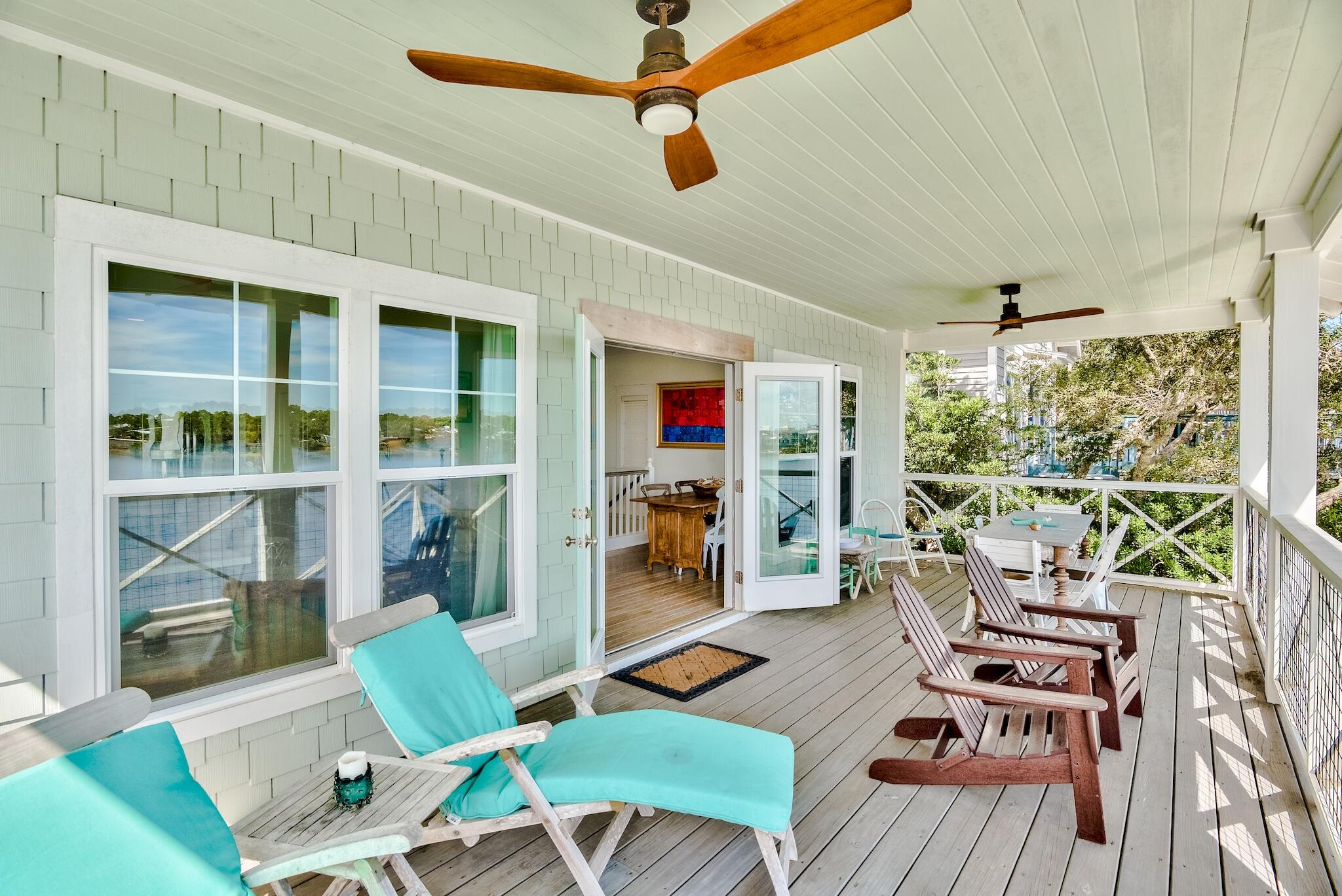 301 South Gulf Drive Santa Rosa Beach, FL 32459 - Photo 20 of 26 a work room with furniture and a window