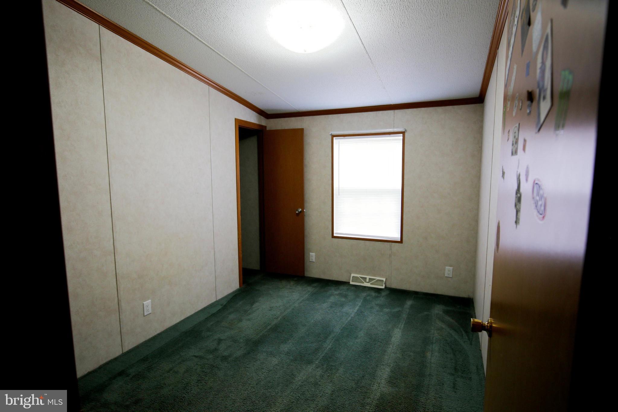 2437 Lebanon Road Manheim, PA 17545 - Photo 18 of 26 a view of an empty room with a window