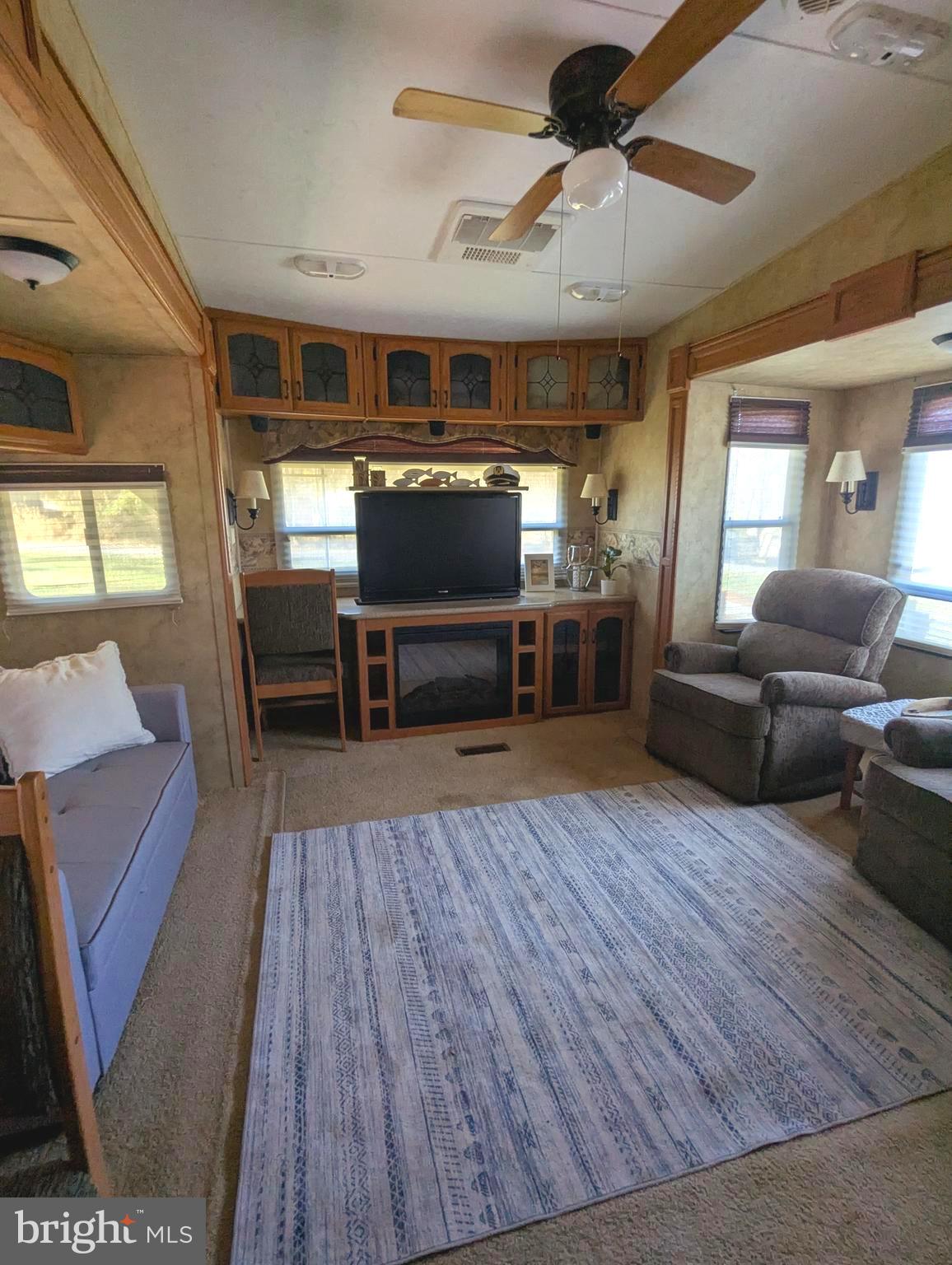 8 Ranger Road Falling Waters, WV 25419 - Photo 14 of 18 a living room with furniture and a wooden floor
