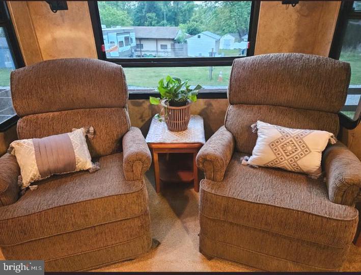 8 Ranger Road Falling Waters, WV 25419 - Photo 18 of 18 a living room with furniture and a potted plant