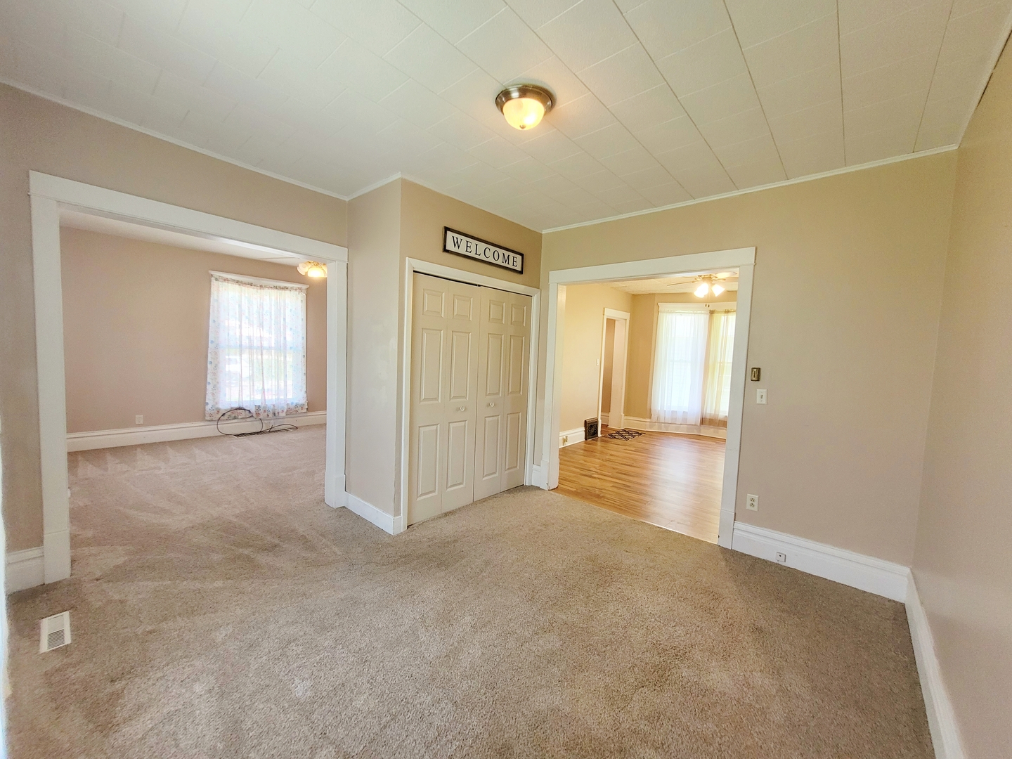 505 East Main Street Morrison, IL 61270 - Photo 11 of 27 a view of a livingroom with wooden floor and a bathroom