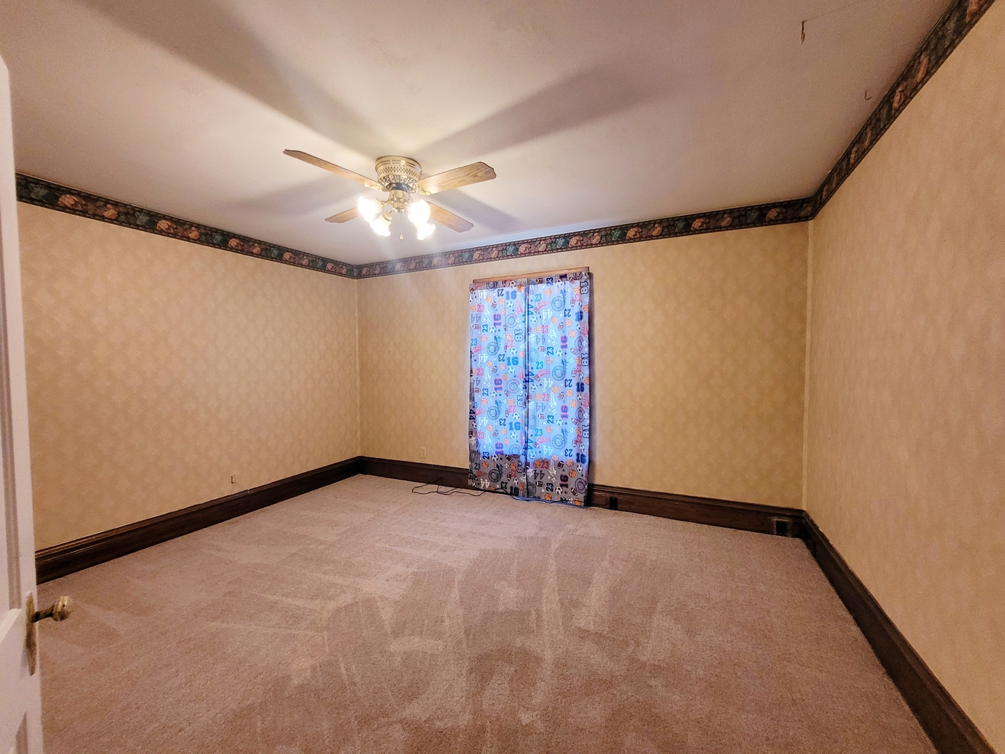 505 East Main Street Morrison, IL 61270 - Photo 23 of 27 a view of an empty room with a window