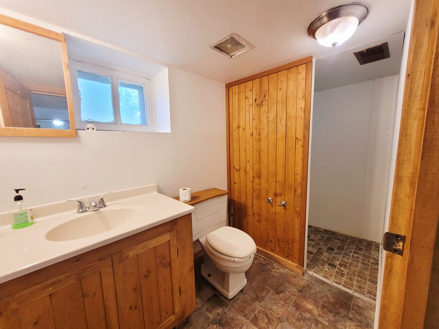 505 East Main Street Morrison, IL 61270 - Photo 27 of 27 a bathroom with a sink a toilet and shower