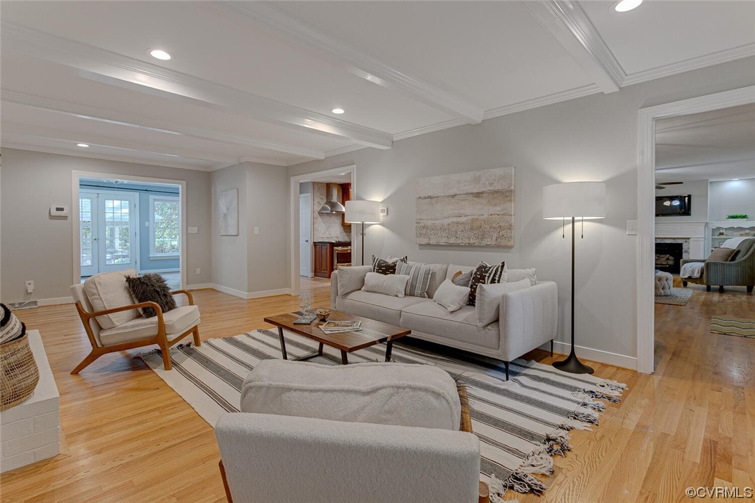 1310 King William Woods Road Midlothian, VA 23113 - Photo 13 of 42 a living room with furniture and a wooden floor