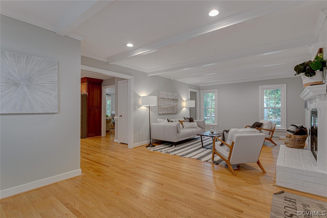 1310 King William Woods Road Midlothian, VA 23113 - Photo 15 of 42 a living room with furniture and a wooden floor