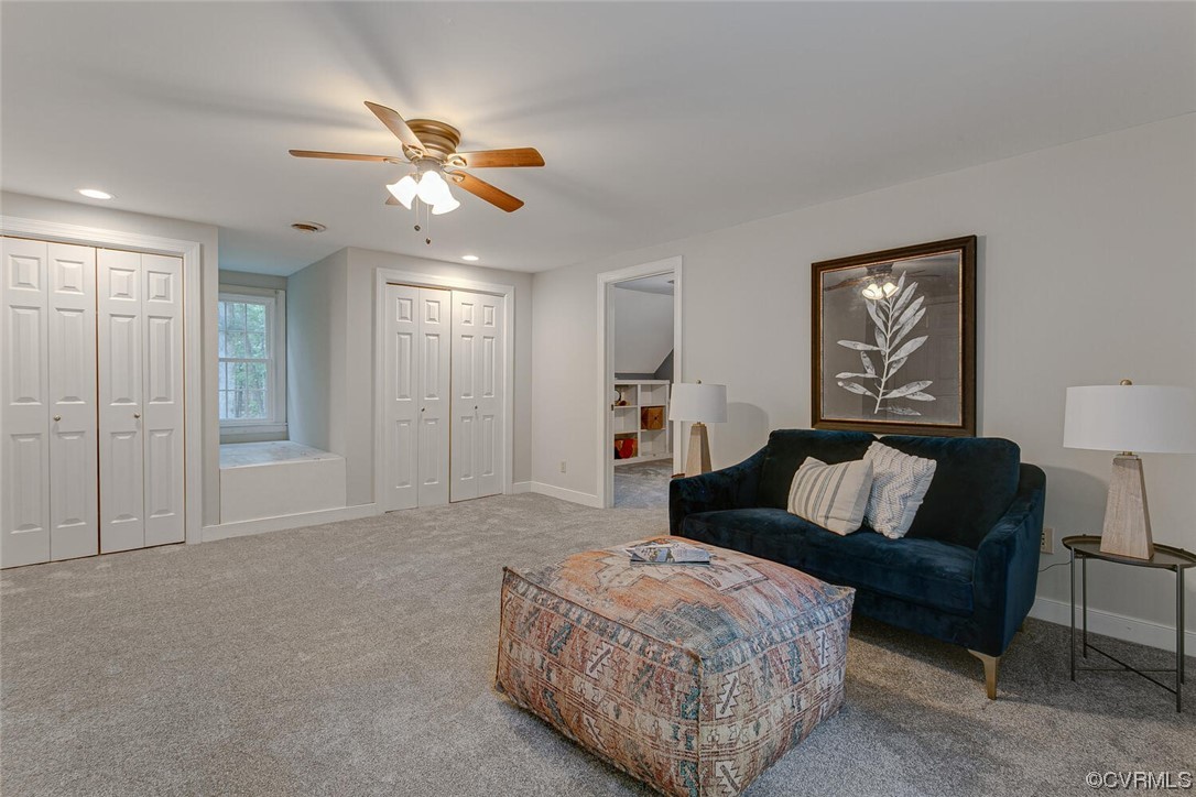 1310 King William Woods Road Midlothian, VA 23113 - Photo 24 of 42 a living room with furniture and a ceiling fan