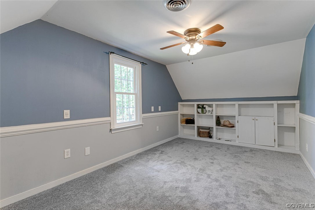1310 King William Woods Road Midlothian, VA 23113 - Photo 25 of 42 a view of a livingroom with a ceiling fan and window