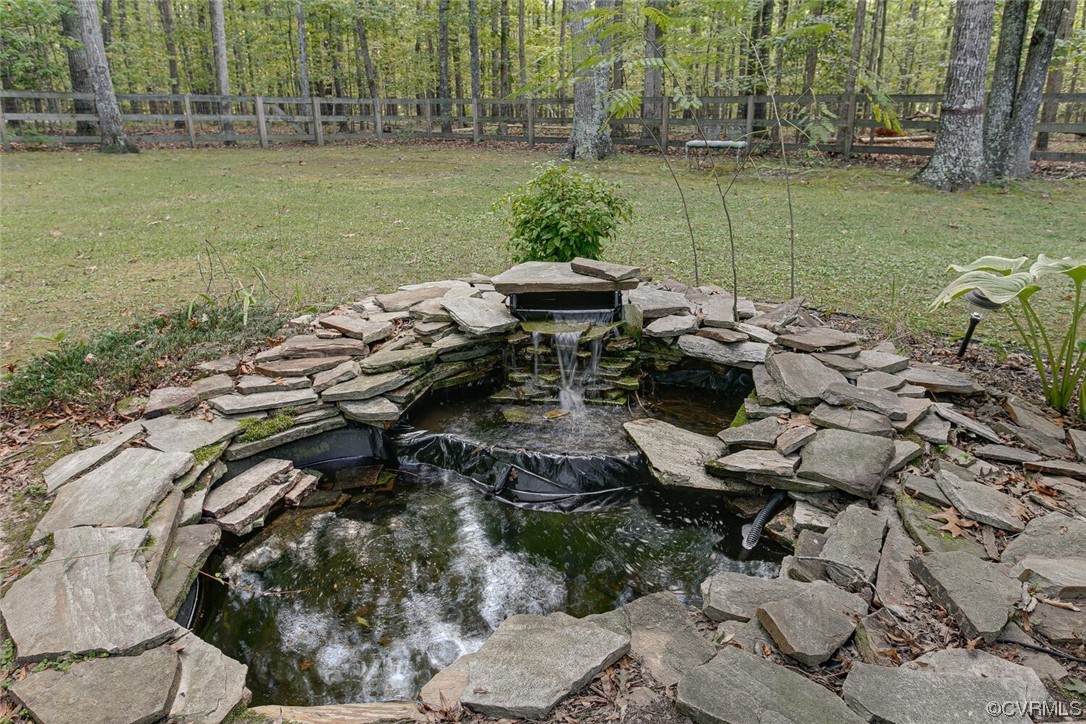 1310 King William Woods Road Midlothian, VA 23113 - Photo 37 of 42 a view of a lake with outdoor space