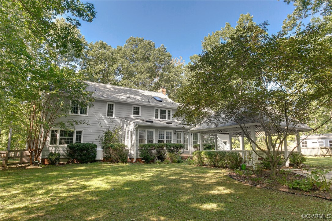 1310 King William Woods Road Midlothian, VA 23113 - Photo 39 of 42 a front view of a house with a garden