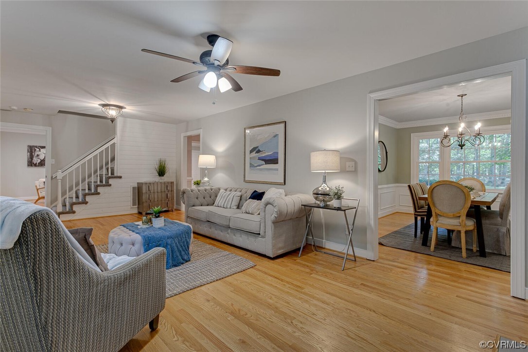 1310 King William Woods Road Midlothian, VA 23113 - Photo 6 of 42 a living room with furniture and wooden floor