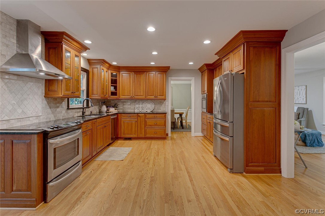 1310 King William Woods Road Midlothian, VA 23113 - Photo 10 of 42 a large kitchen with stainless steel appliances granite countertop a stove a sink dishwasher and a refrigerator