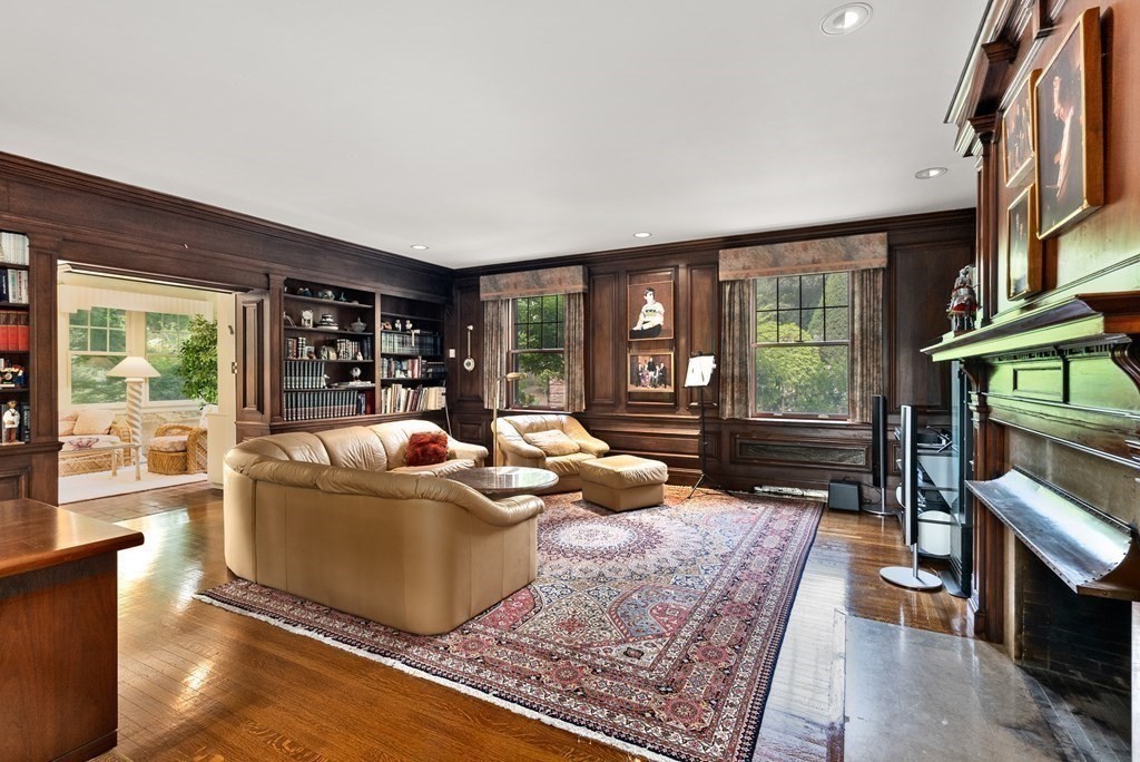 170 Hyslop Road Brookline, MA 02445 - Photo 15 of 37 a living room with furniture and a fireplace