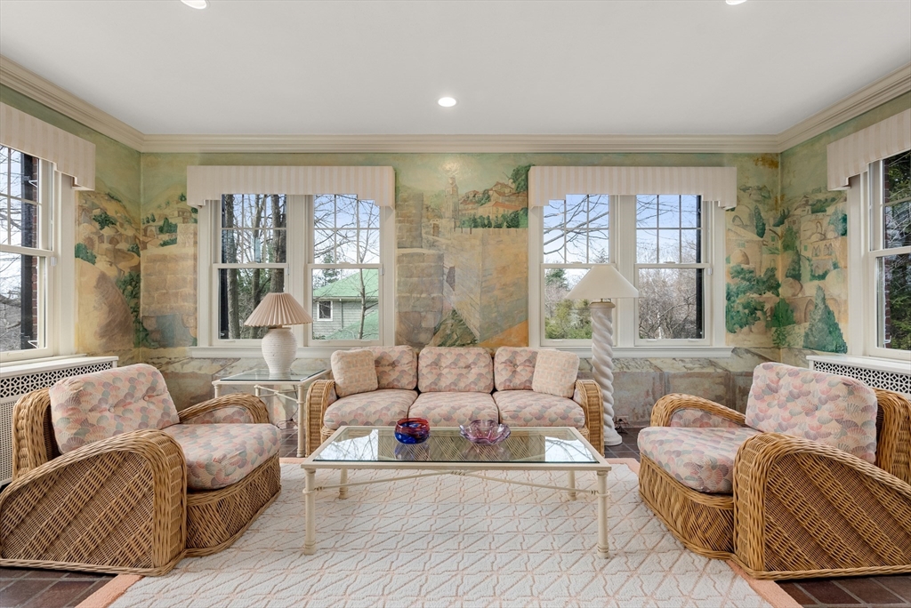 170 Hyslop Road Brookline, MA 02445 - Photo 16 of 37 a living room with furniture and a large window