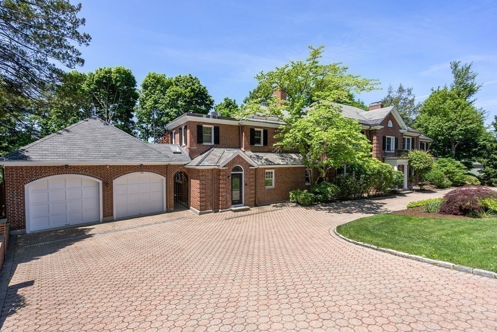 170 Hyslop Road Brookline, MA 02445 - Photo 3 of 37 a front view of a house with a yard and potted plants