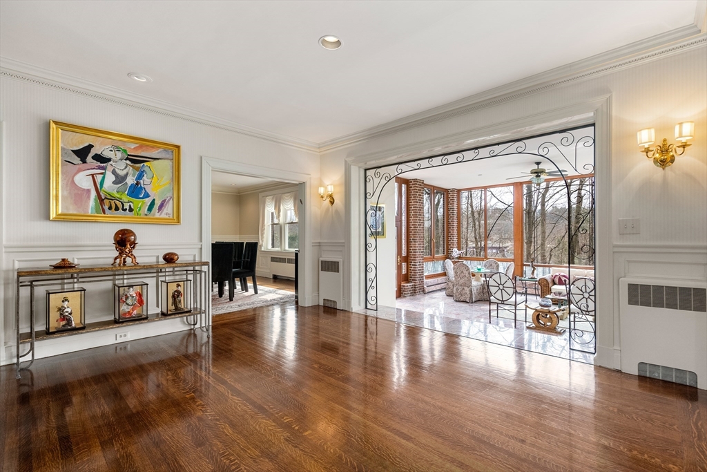 170 Hyslop Road Brookline, MA 02445 - Photo 7 of 37 a living room with furniture and a flat screen tv