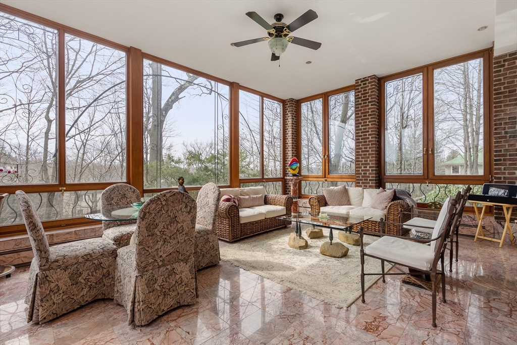 170 Hyslop Road Brookline, MA 02445 - Photo 8 of 37 a living room with furniture and a large window