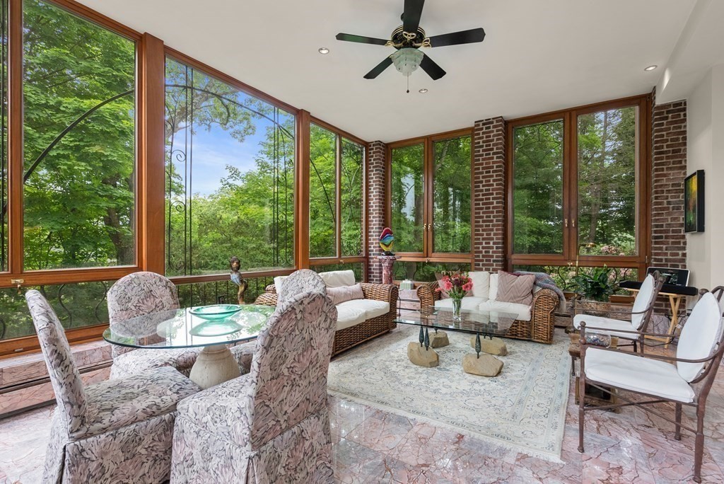 170 Hyslop Road Brookline, MA 02445 - Photo 10 of 37 a living room with furniture and a large window