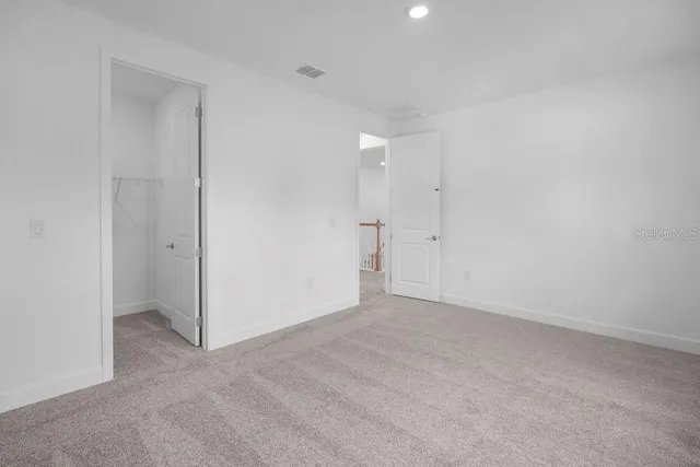 an empty room with an entryway