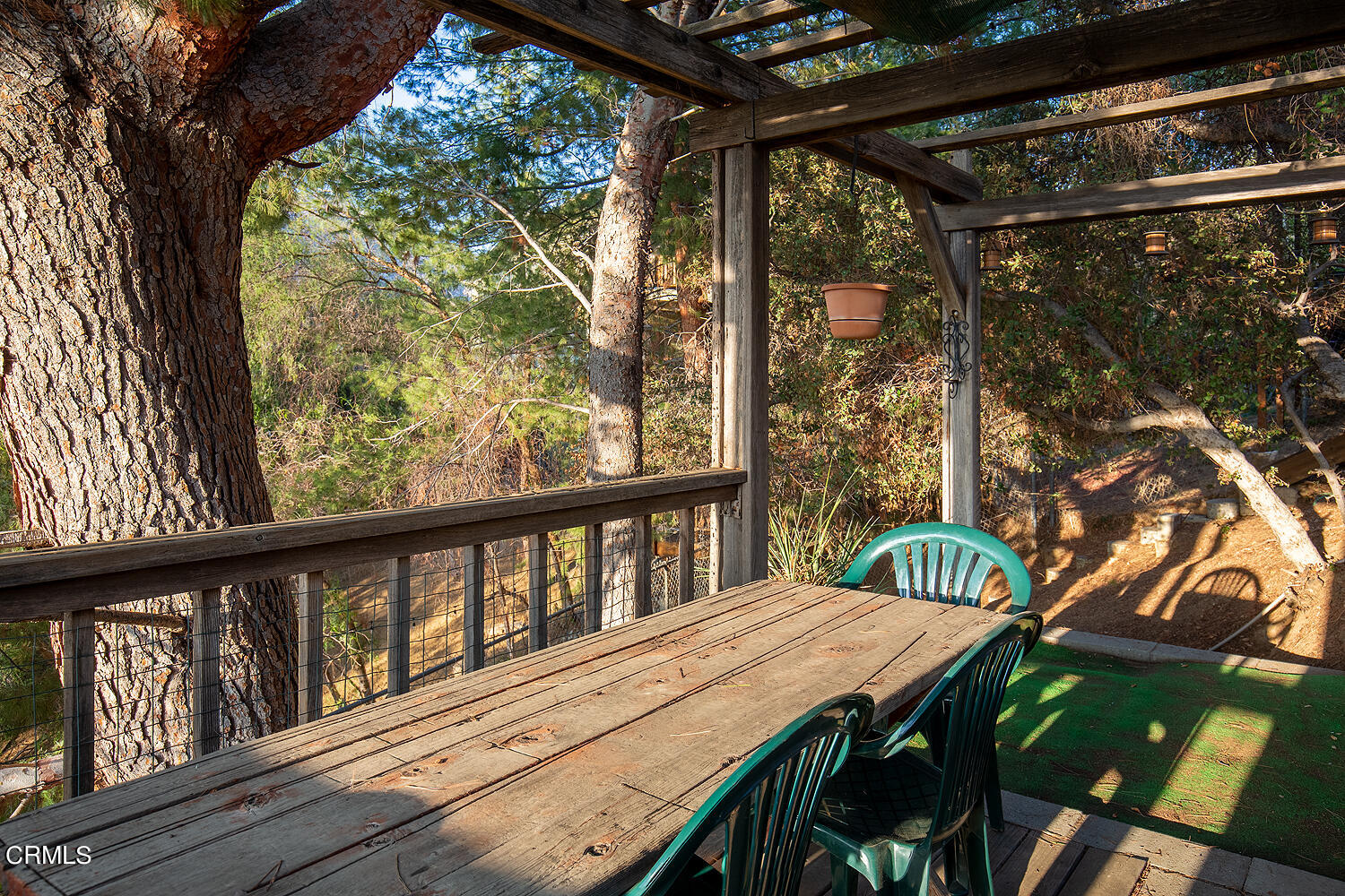7635 Memory Drive Tujunga, CA 91042 - Photo 18 of 21 a balcony with wooden floor table and chairs