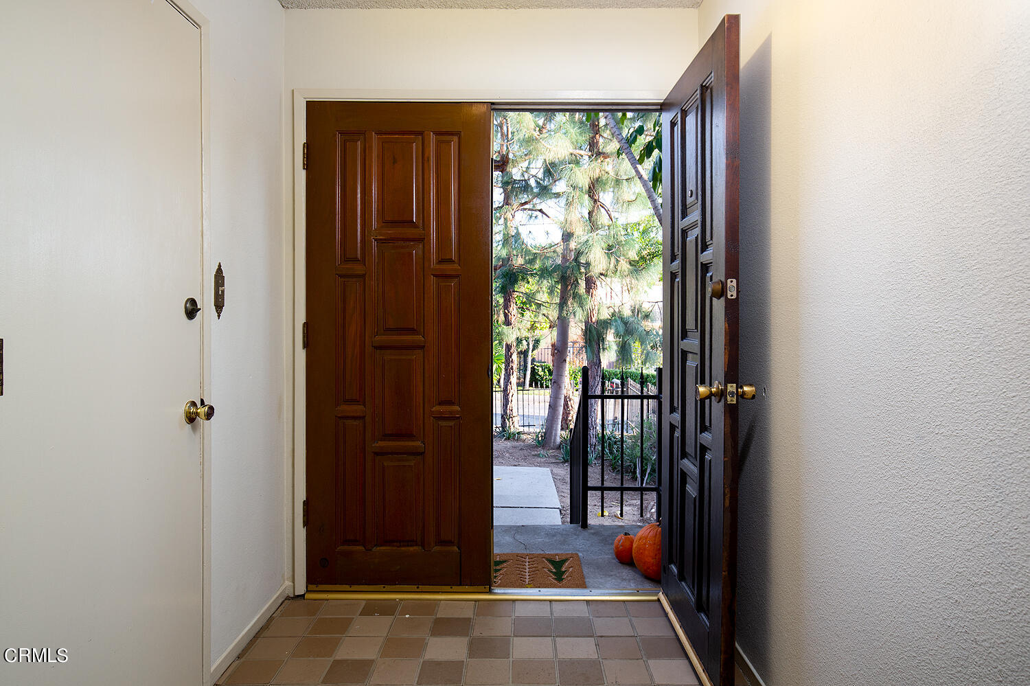 7635 Memory Drive Tujunga, CA 91042 - Photo 4 of 21 a view of a hallway with wooden floor and windows