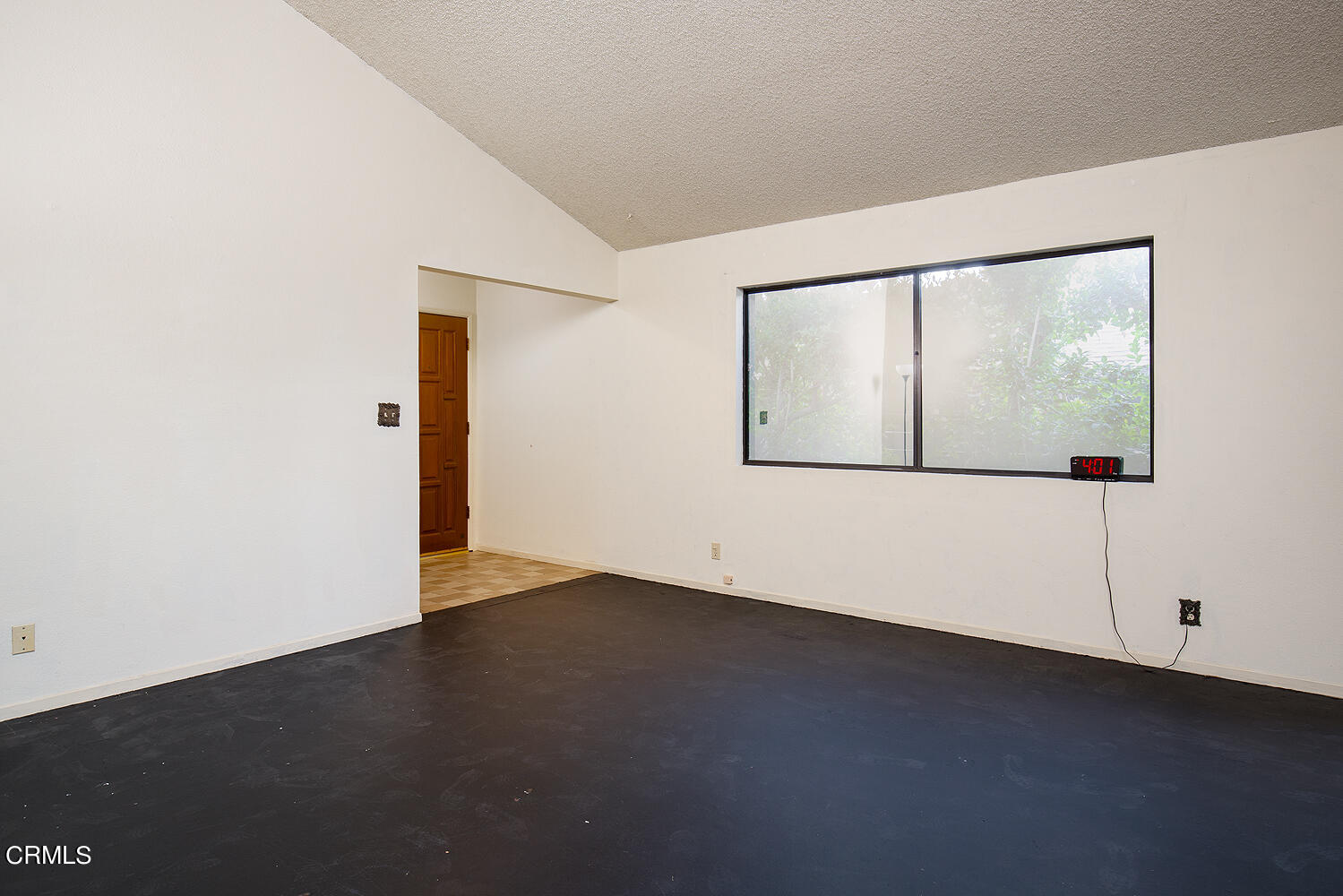 7635 Memory Drive Tujunga, CA 91042 - Photo 5 of 21 an empty room with wooden floor and windows